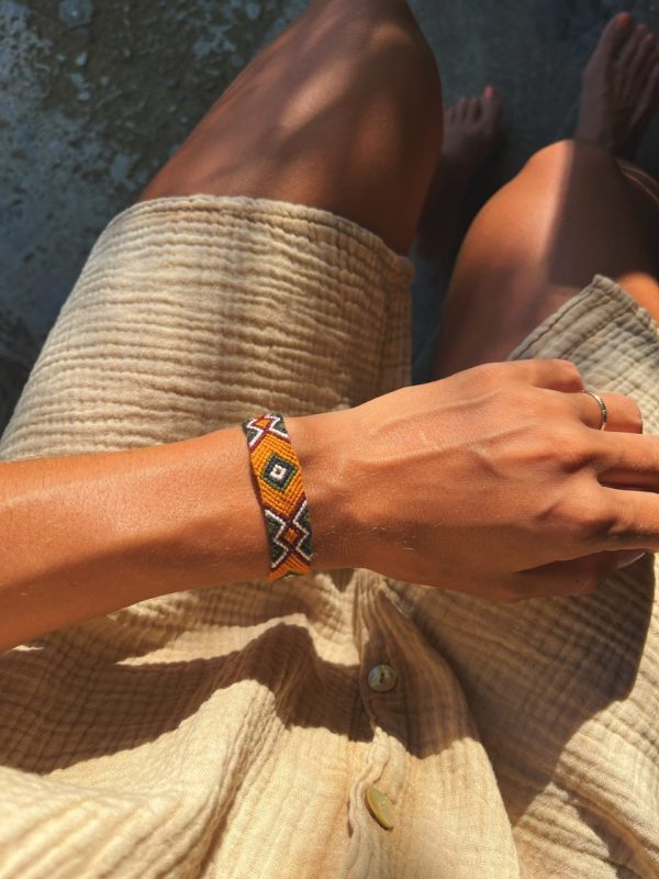 Bracelet tissé unisexe dans les tons orange